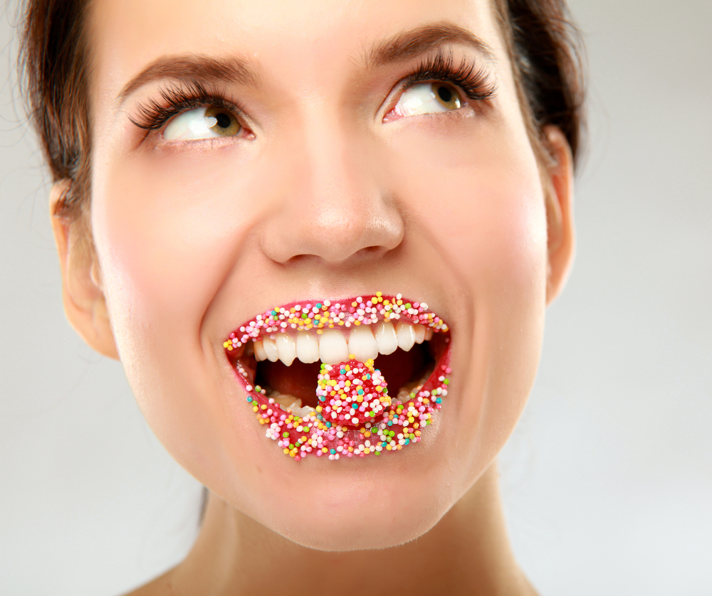 Woman with sugary mouth
